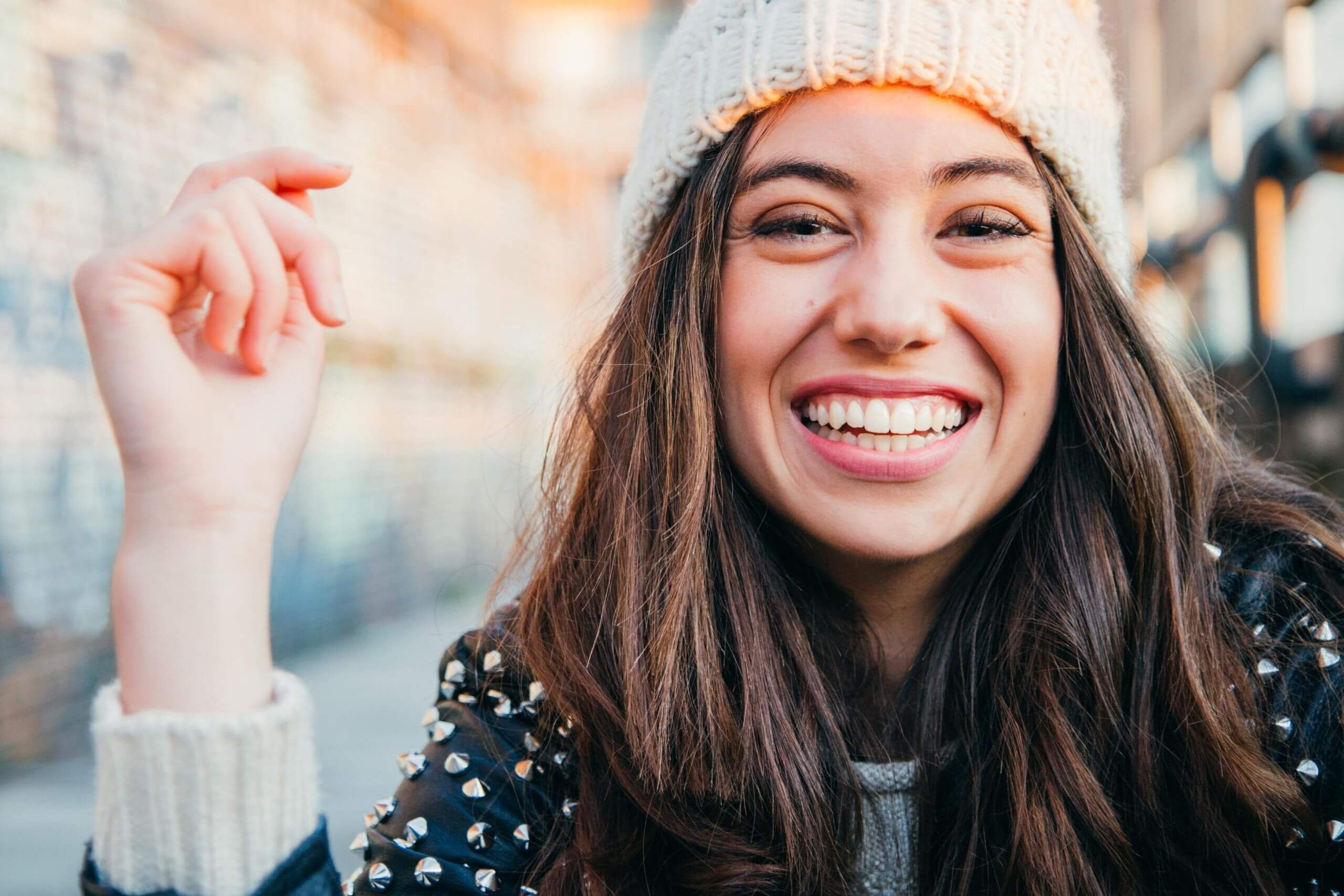 Brunette women smiling into camera