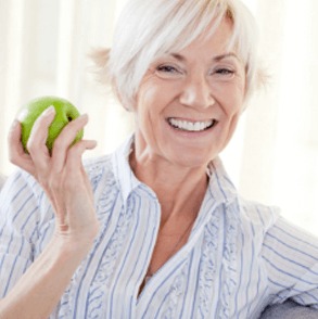 Lady with perfect strong teeth in Bolton