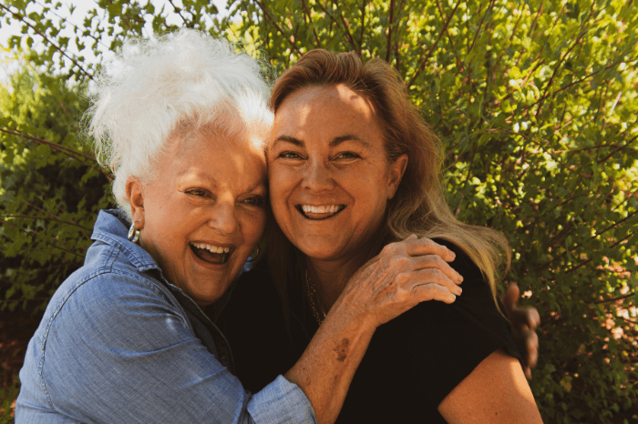 woman with dental implants in Harwood smiling