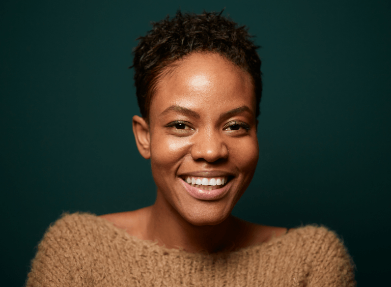 Woman smiling with dental implants